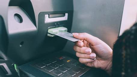 Citibank customer withdrawing cash through citibank debit card